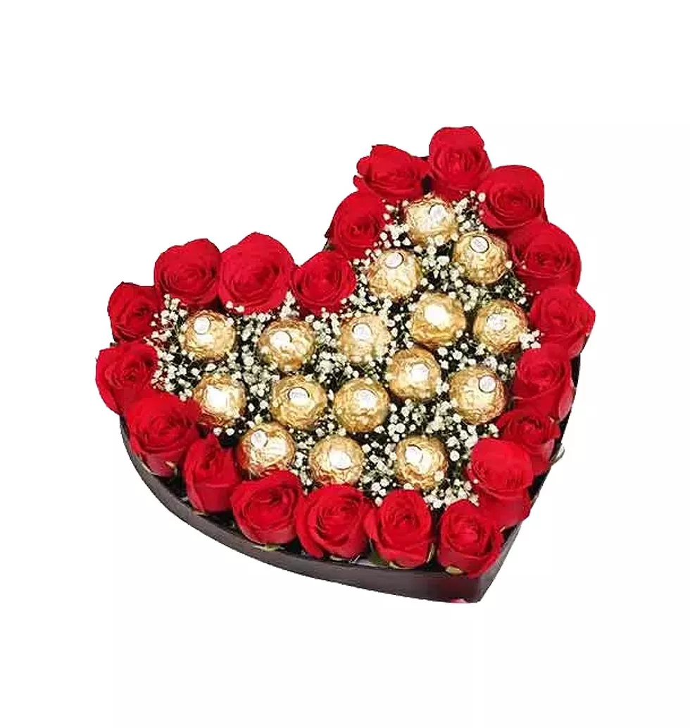Heart shapped ferrero chocolates with red roses