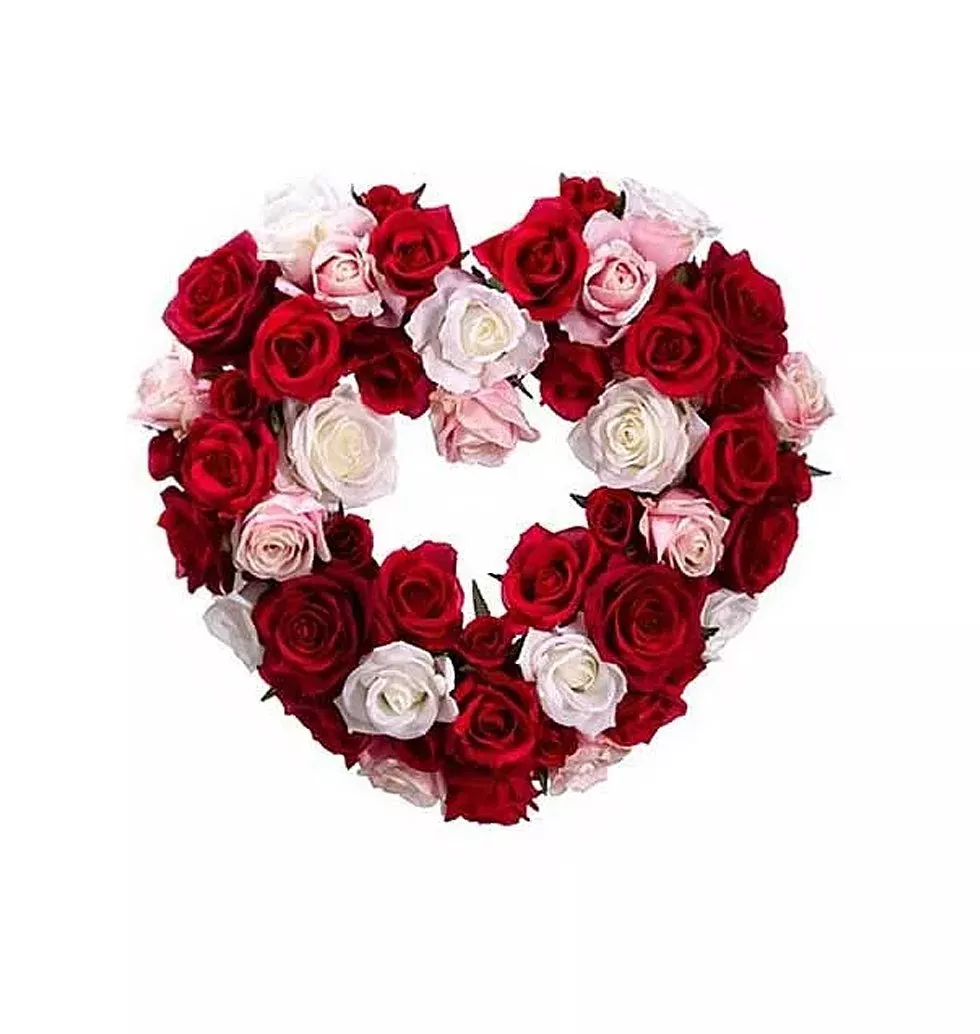 Red and pink roses in a heart shape basket.